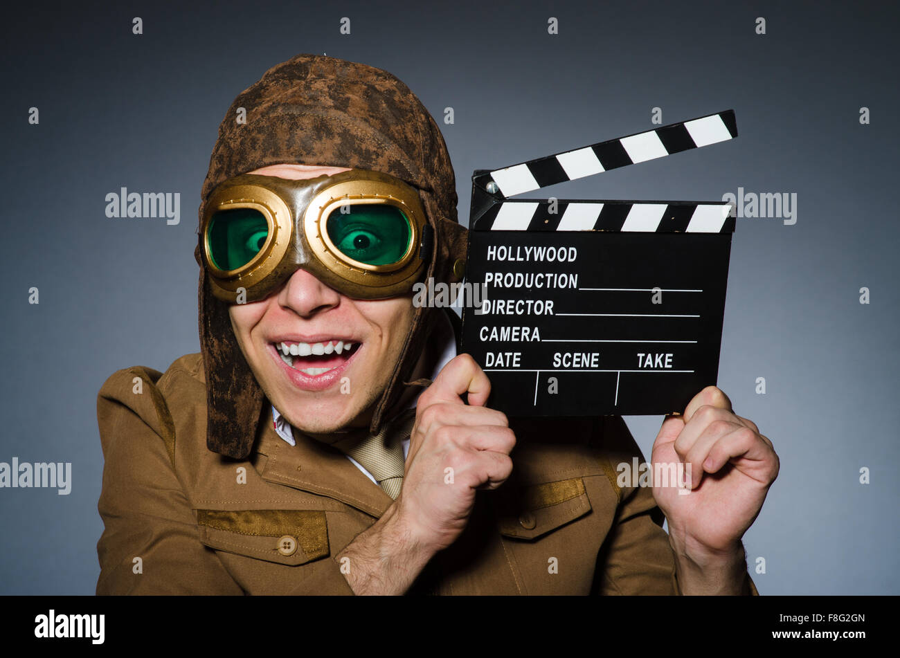 Funny pilot with goggles and helmet Stock Photo Alamy