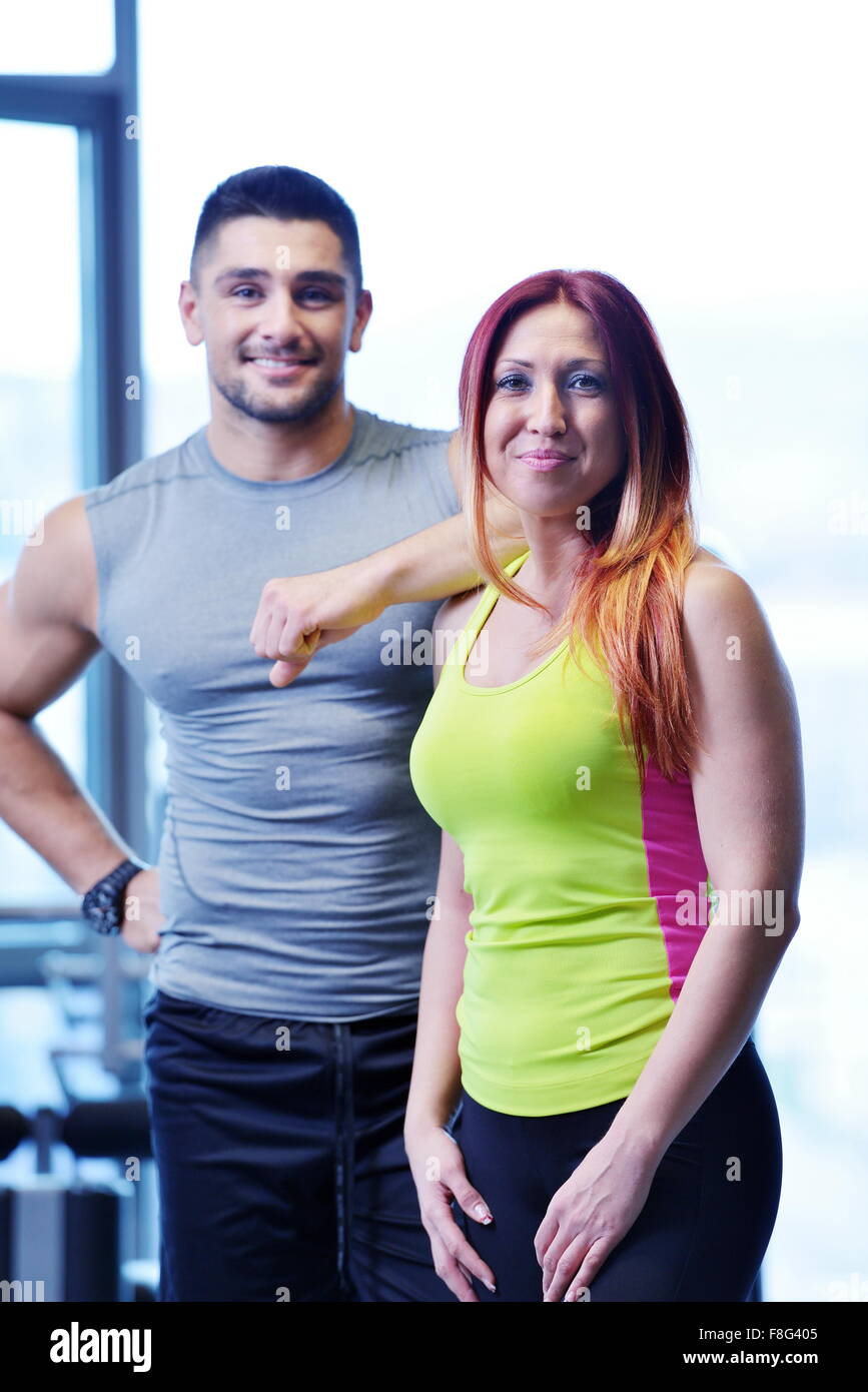 attractive couple at the gym looking happy Stock Photo - Alamy
