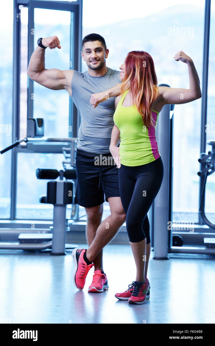 attractive couple at the gym looking happy Stock Photo - Alamy
