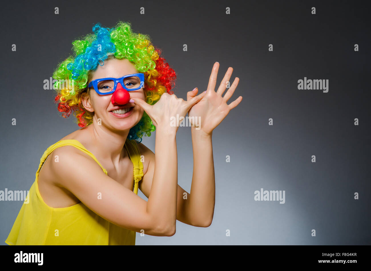 Funny woman in clown dressing Stock Photo Alamy