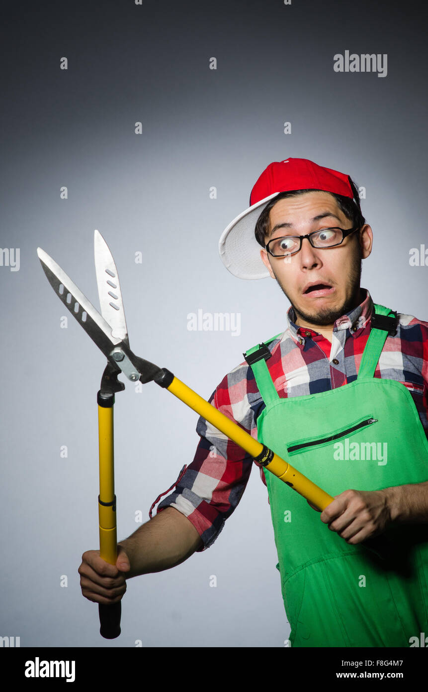 Funny man with giant shears Stock Photo Alamy