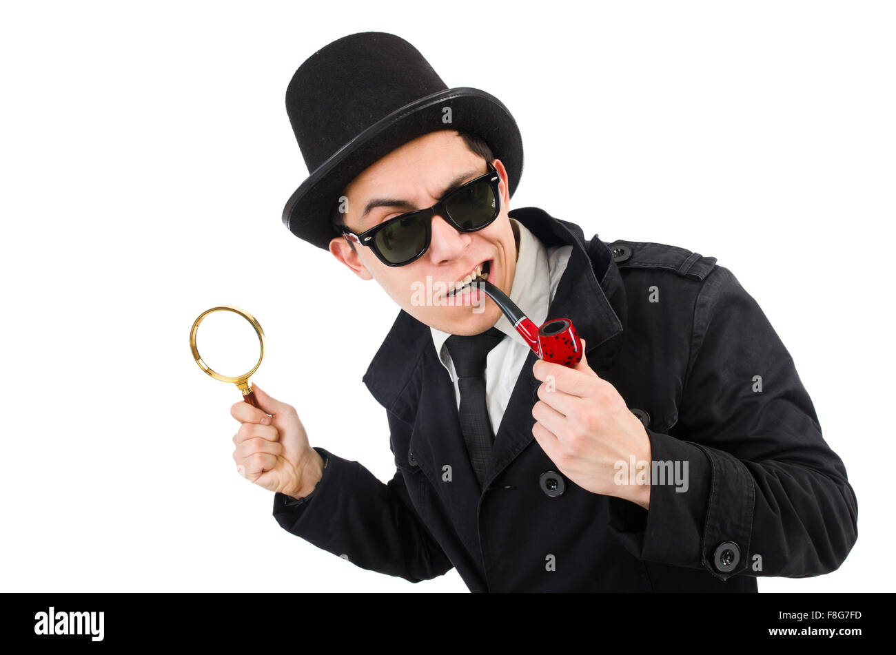 Young detective with pipe and magnifying glass Stock Photo - Alamy