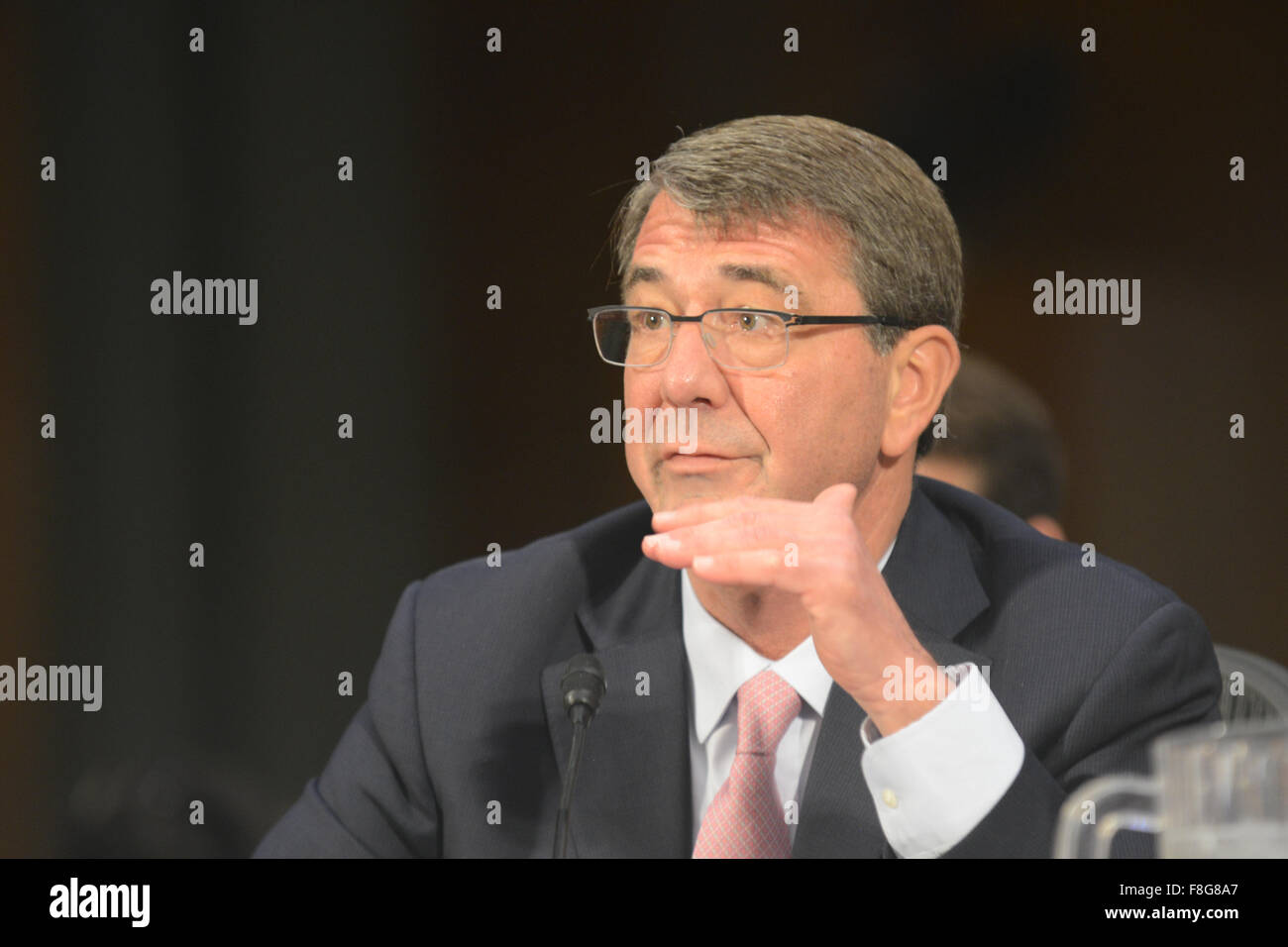 (151209)-- WASHINGTON D.C., Dec. 9, 2015 (Xinhua) -- U.S. Defense Secretary Ash Carter testifies before the Sneate Armed Services Committee on the U.S. strategy to counter the Islamic State of Iraq and the Levant and the U.S. policy toward Iraq and Syria, in Washington, DC, the United States, Dec. 9, 2015. U.S. Defense Secretary Ash Carter said on Wednesday the Pentagon was prepared to assist the Iraqi government with more personnel and attack helicopters to retake the key Iraqi city of Ramadi from the Islamic State (IS). (Xinhua/Zheng Qihang) Stock Photo