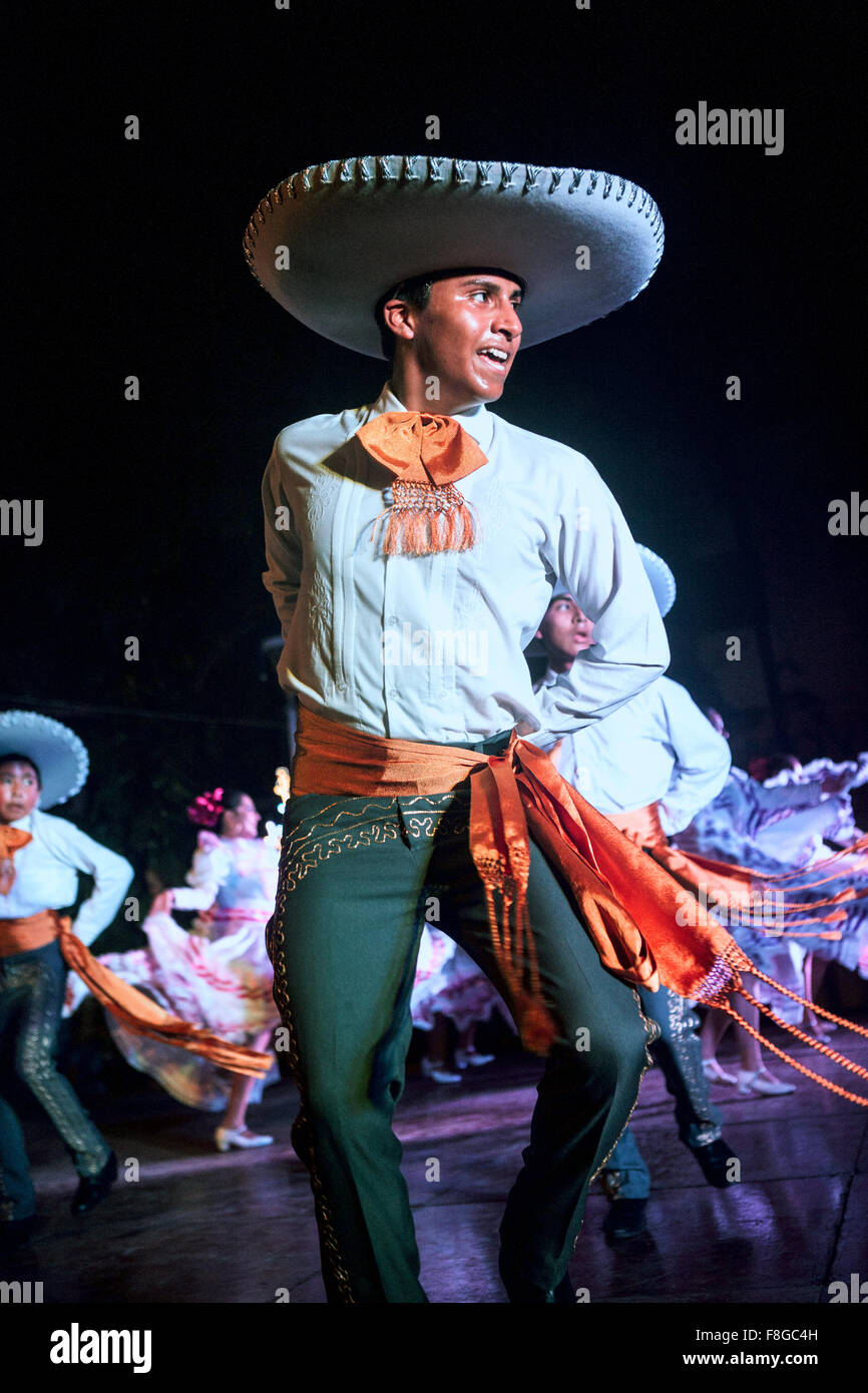 A male dancer preforming Jarabe Tapatio a traditional Mexican folk dance on stage in Merida Mexico Stock Photo Alamy