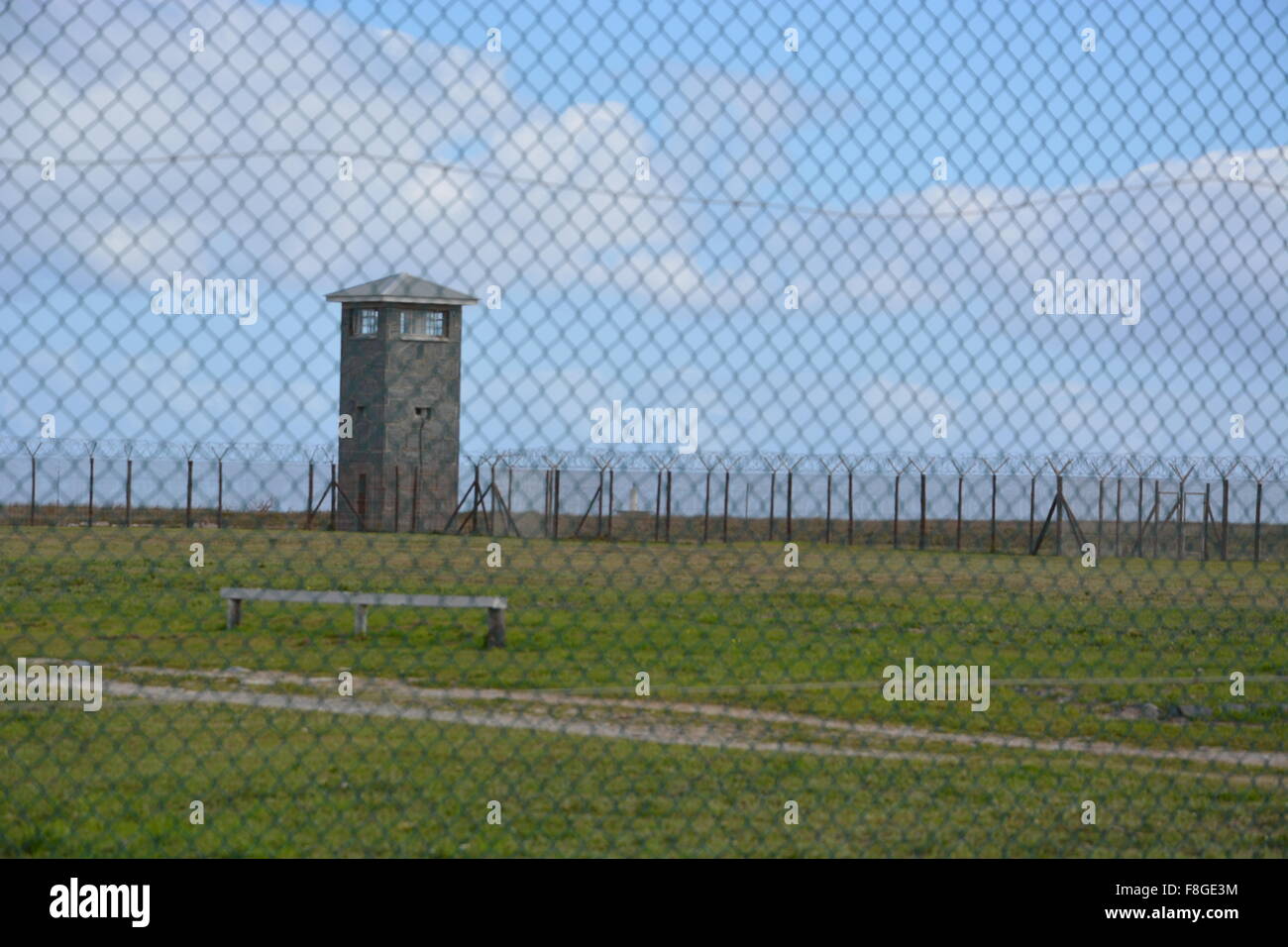 A guard tower overlooks an exercise yard at the Robben Island Prison off of Cape Town South Africa. Stock Photo