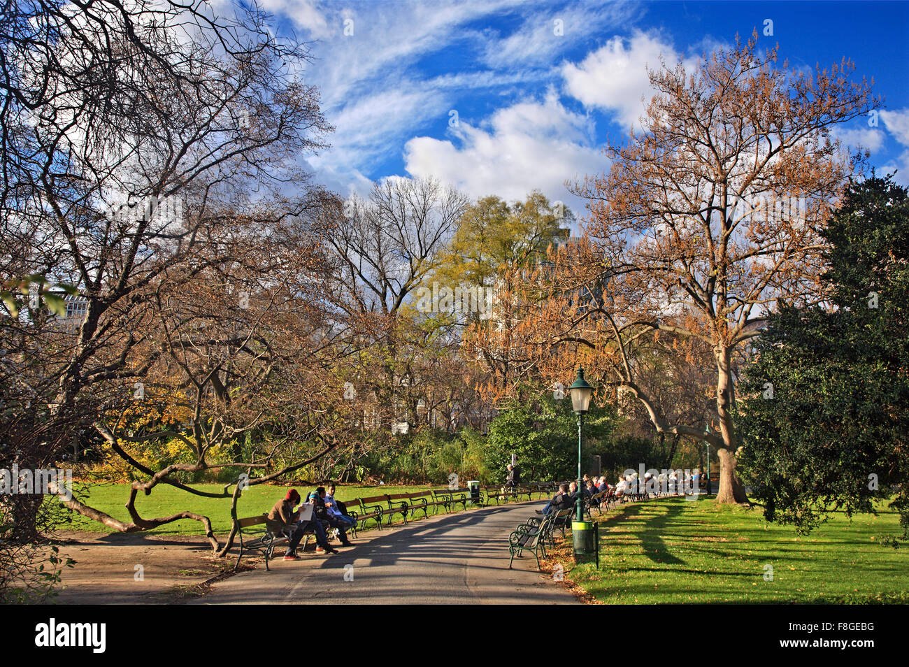 People enjoying the sun in Stadtpark, one of the countless parks of Vienna, Austria. Stock Photo