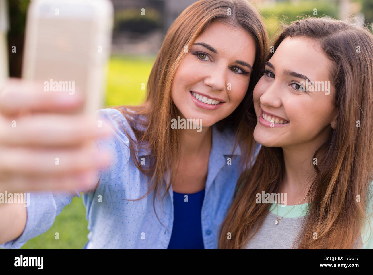 Mother and daughter taking selfie outdoors Stock Photo Alamy