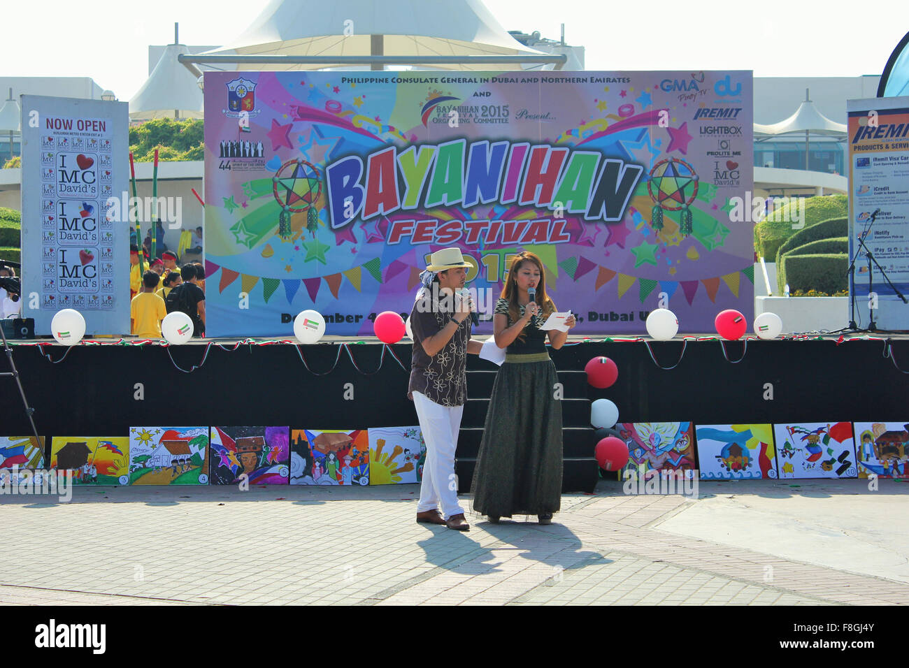 Dubai, United Arab Emirates. 04th Dec, 2015. The event host Emil Barcenilla (left) and Reeza Simpson (right). Filipino in Dubai celebrates the Bayanihan Festival held at Al Mamzar Beach Park. The event also showcased talents of Filipinos in singing, dancing, arts, sports, hosting, game activities and raffle promotion. © Robert Oswald Alfiler/Pacific Press/Alamy Live News Stock Photo