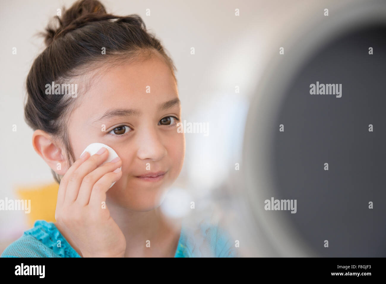Girl washing her face Stock Photo Alamy