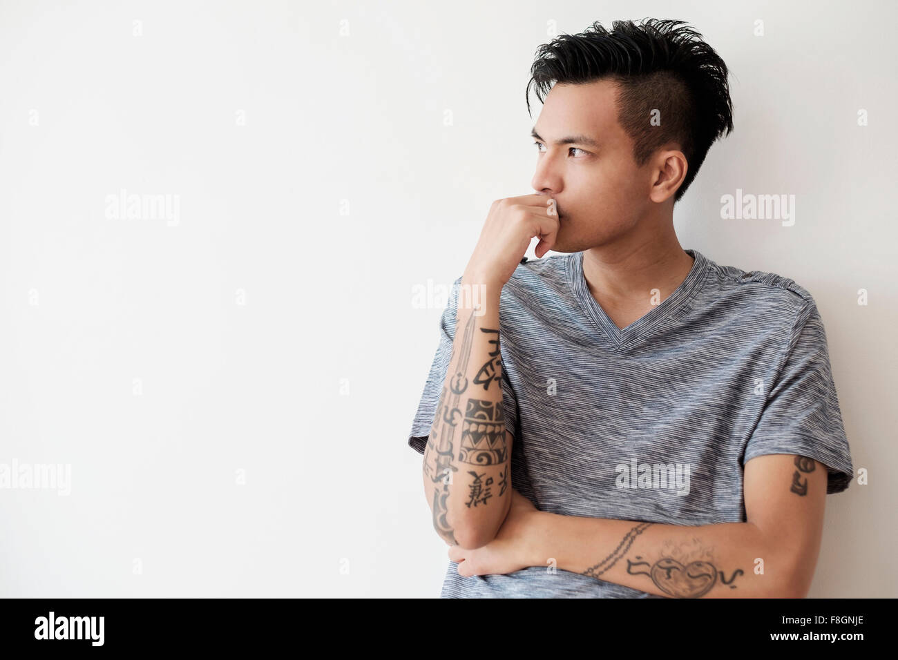 Asian man thinking Stock Photo