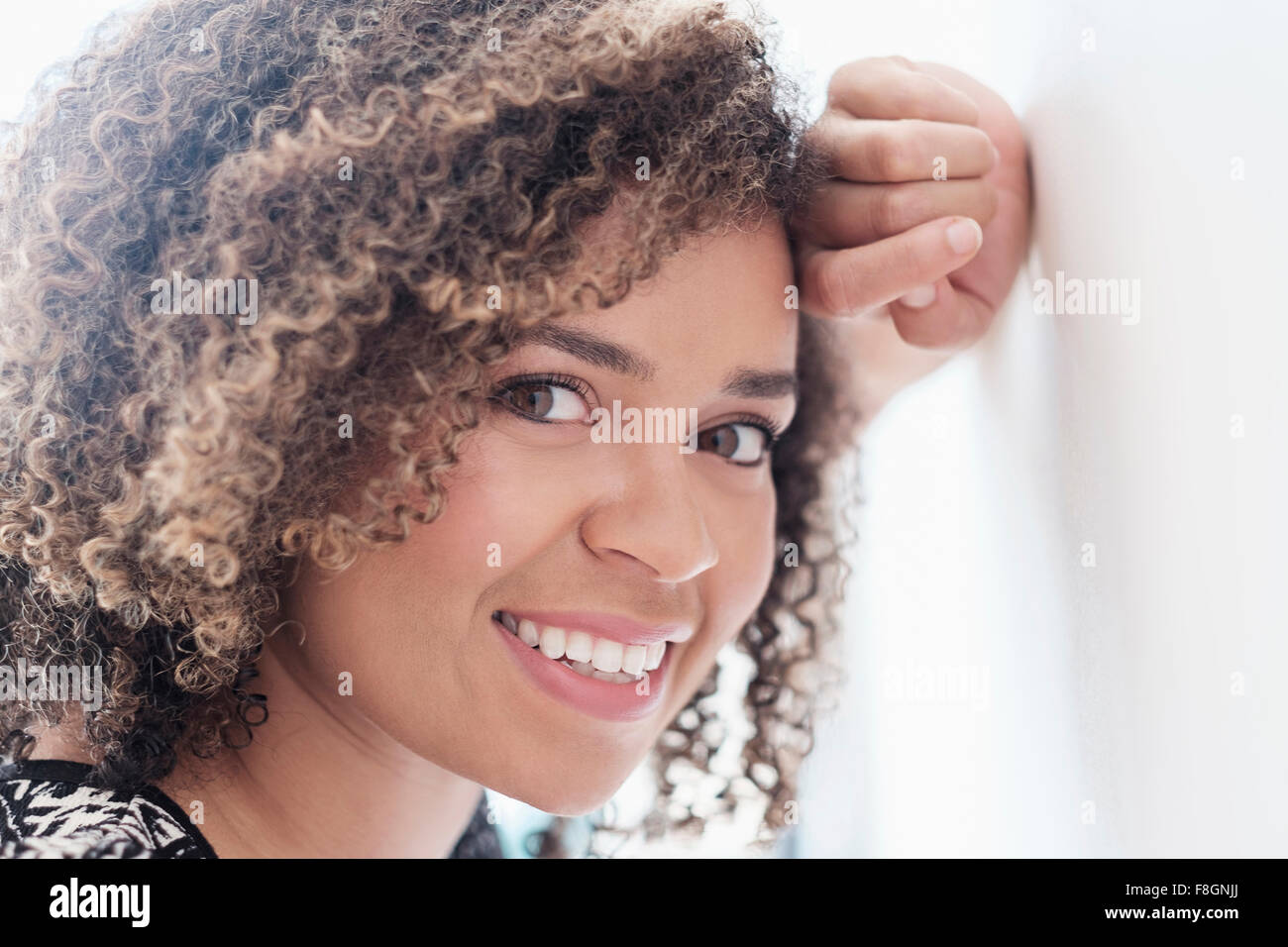 Mixed race woman smiling Stock Photo