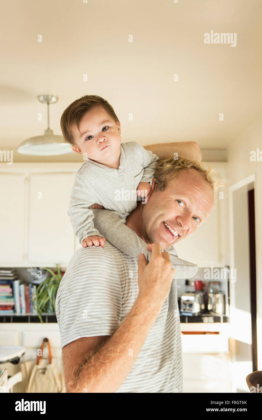 carrying baby on shoulders