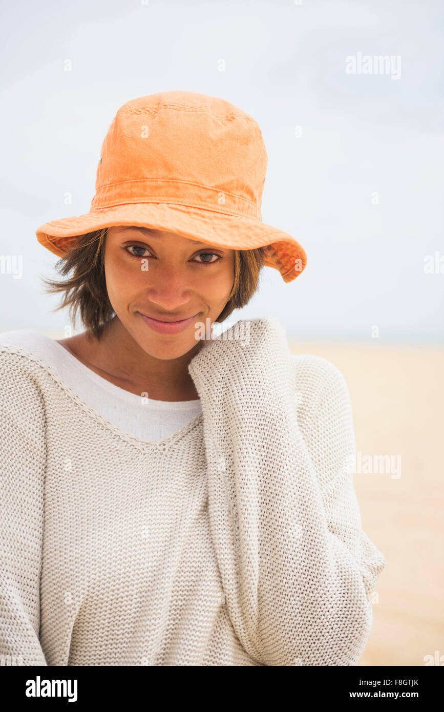 African American woman wearing sun hat Stock Photo Alamy