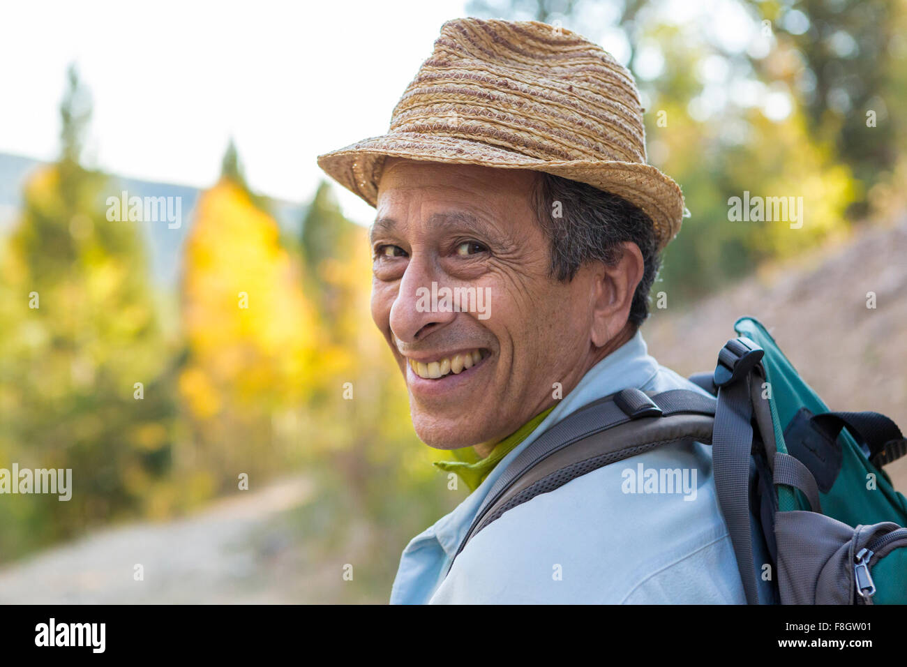 Man exploring autumn forest Stock Photo