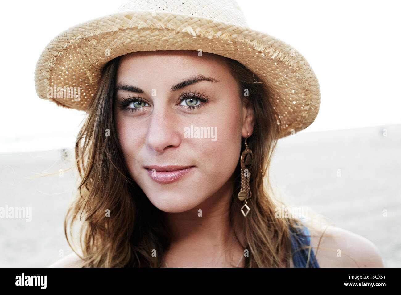 Wearing straw hat hi-res stock photography and images - Alamy