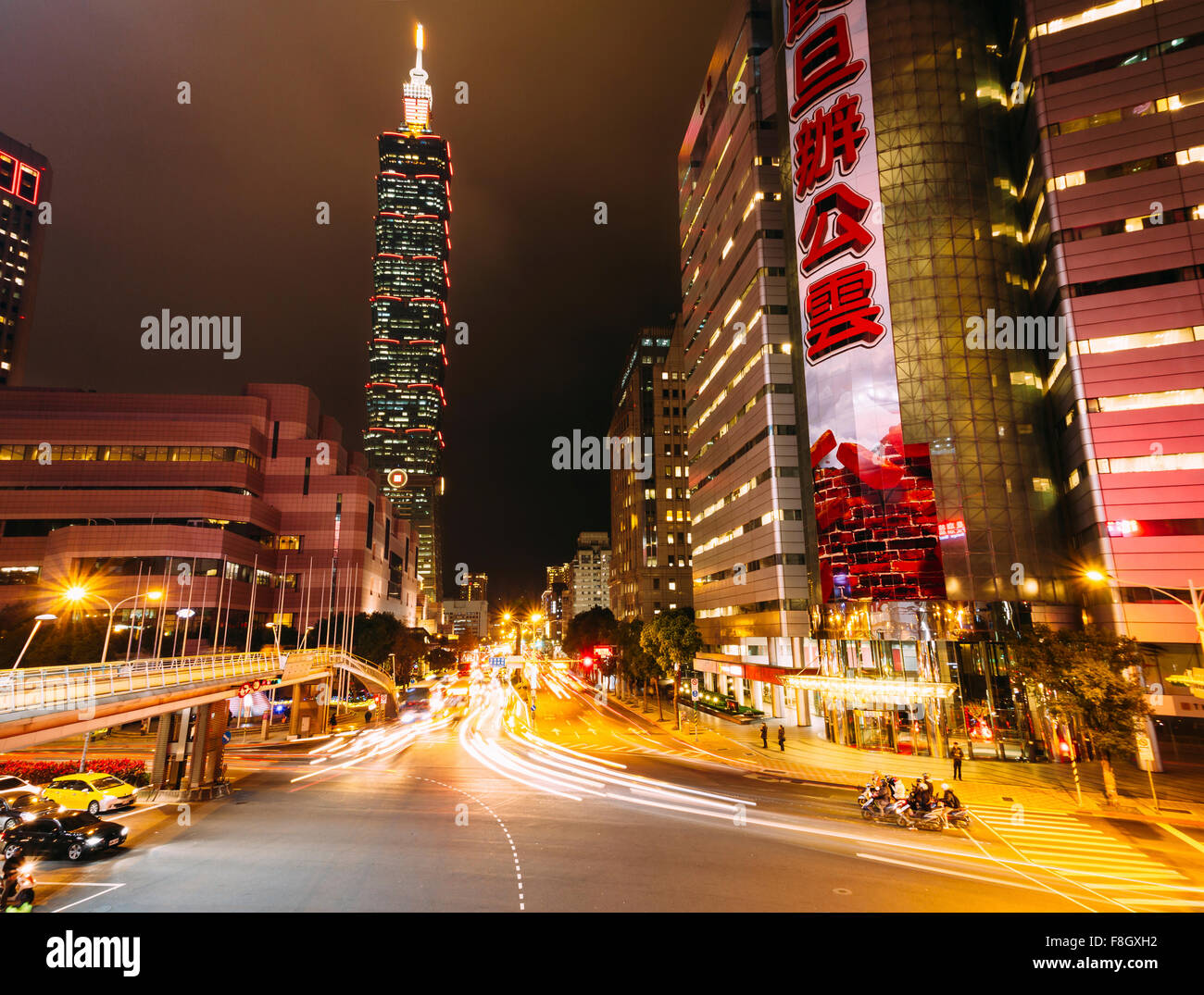 Taipei, Taiwan - night view of busy street and 101 tower. Stock Photo
