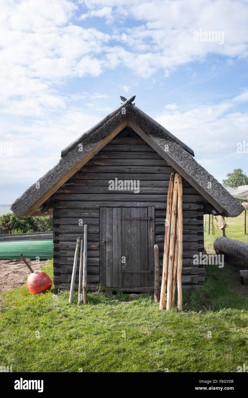 Wood shed under clouds Stock Photo