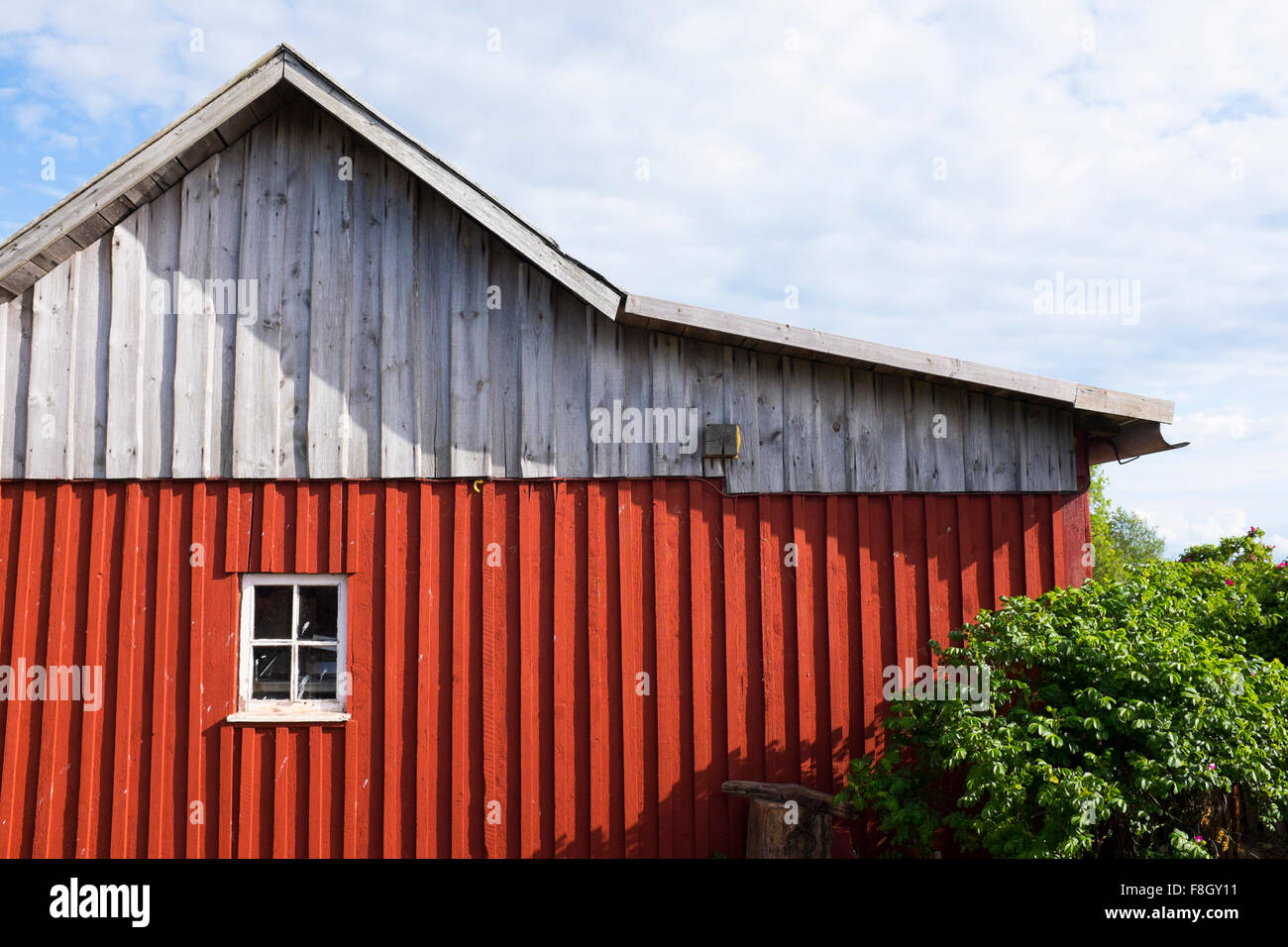Building siding under clouds Stock Photo