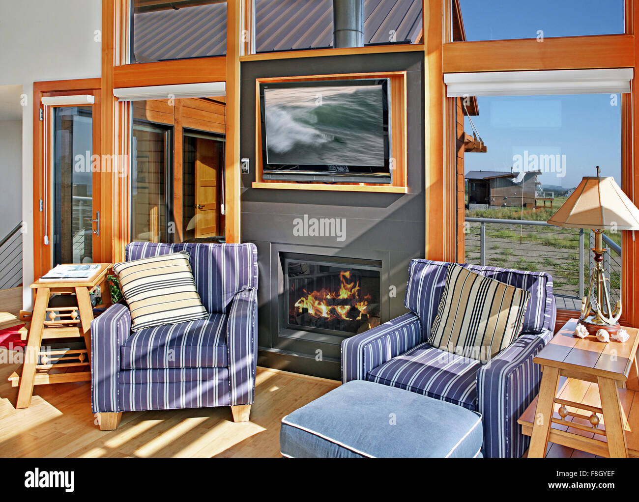Chairs and fireplace in living room Stock Photo Alamy
