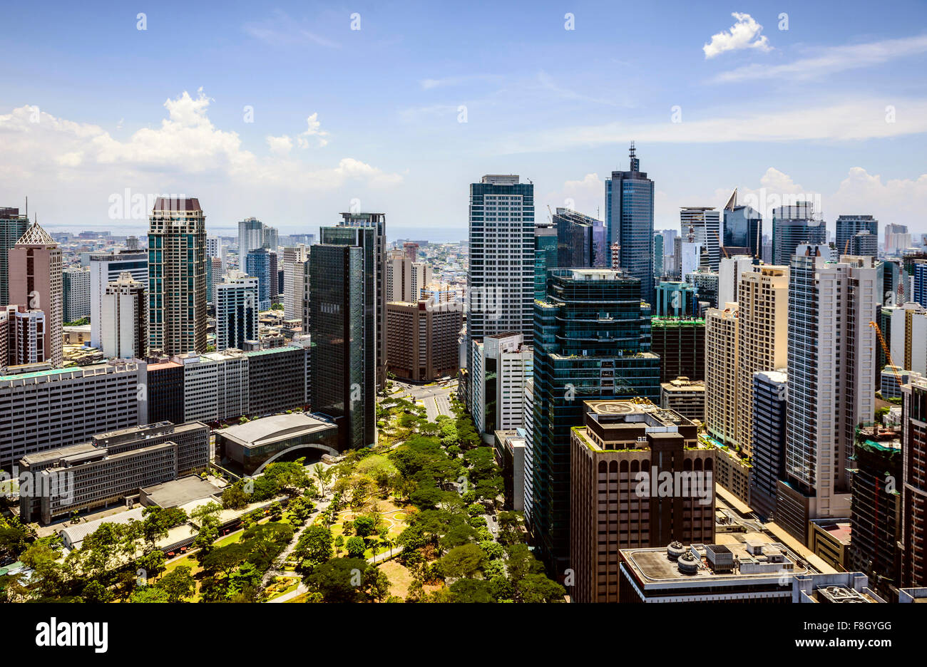 Manila cityscape under blue sky, Philippines Stock Photo