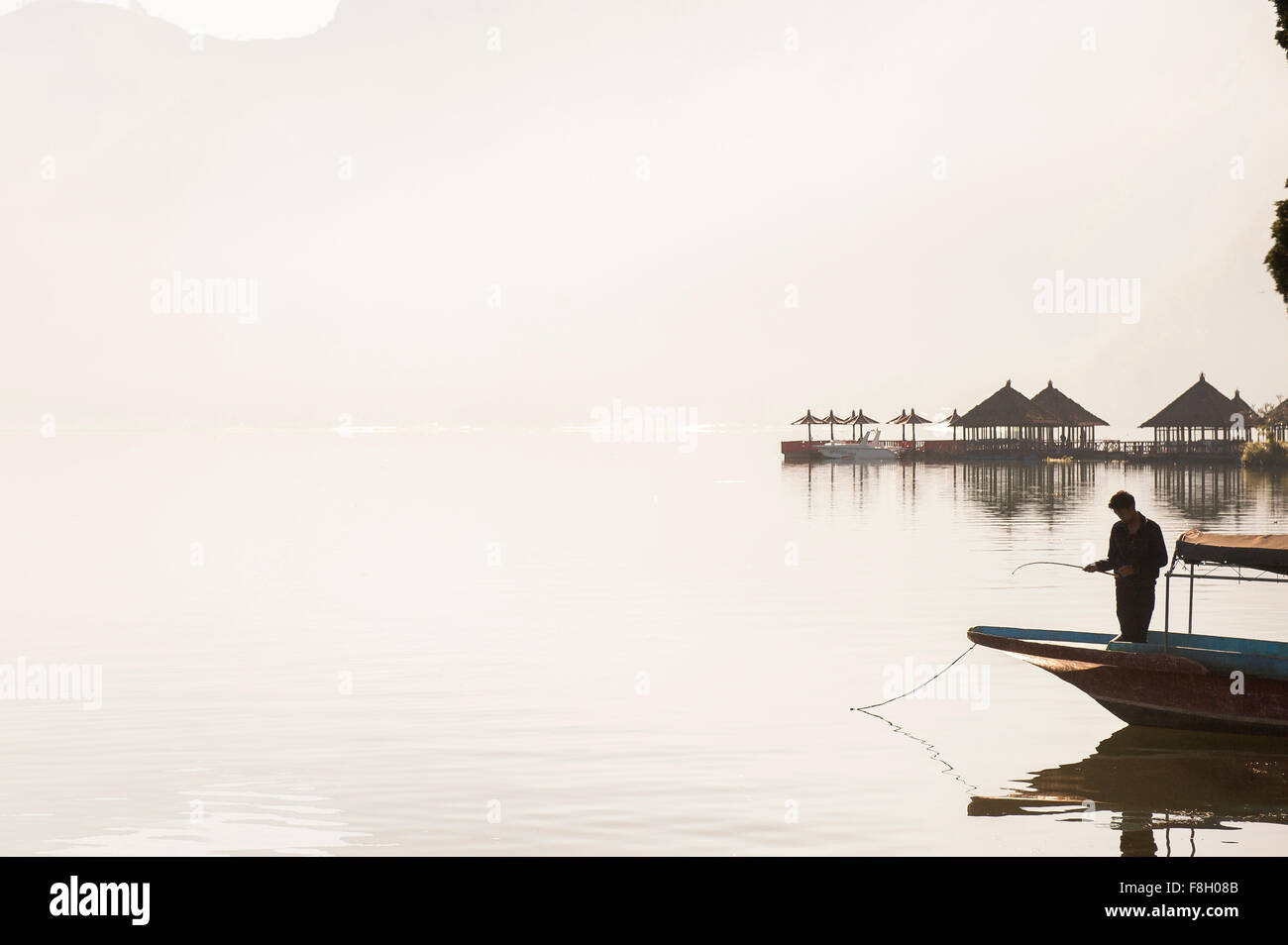 Man standing boat silhouette hi-res stock photography and images - Alamy