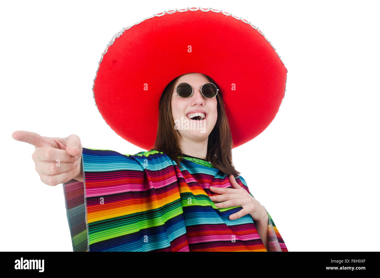 Pretty mexican girl in vivid poncho isolated on white Stock Photo