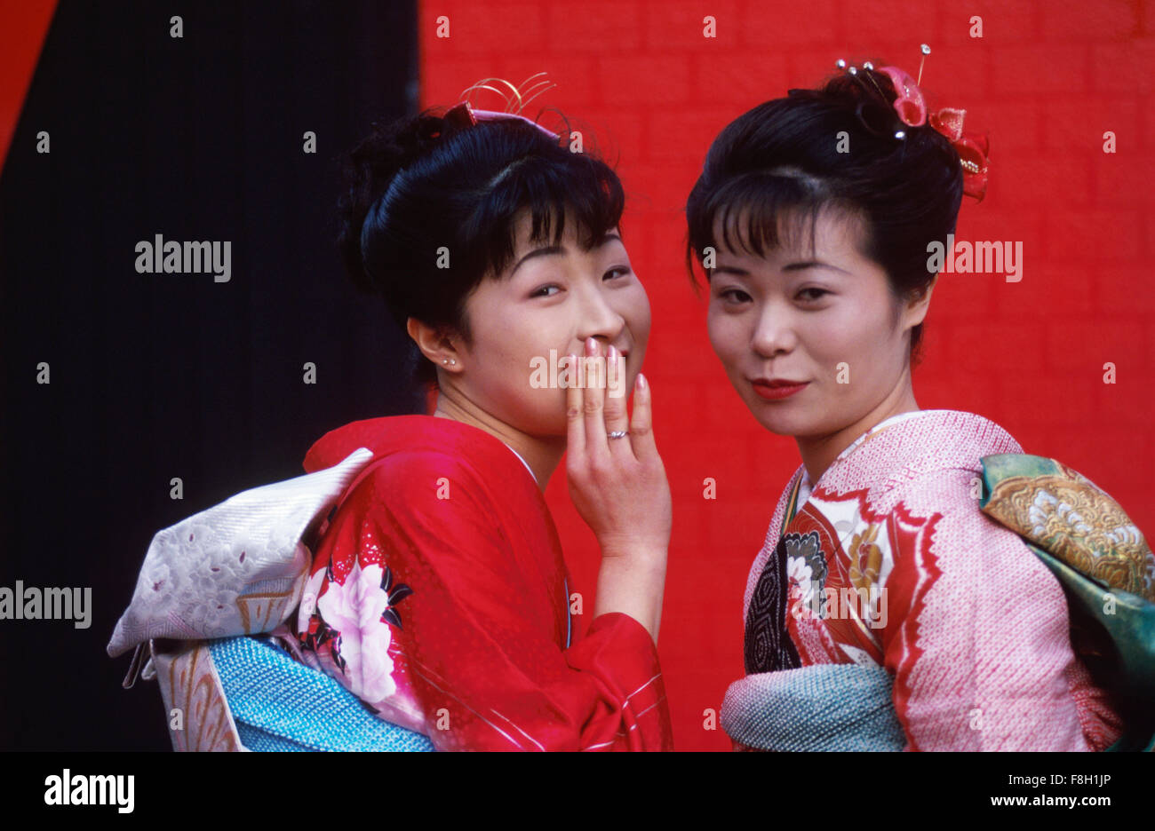 Mariko Tsunekawa and her friend Kikuko Taguchi are dressed in Japanese ceremonial garb in Nagoya, Japan. MODEL RELEASED Stock Photo