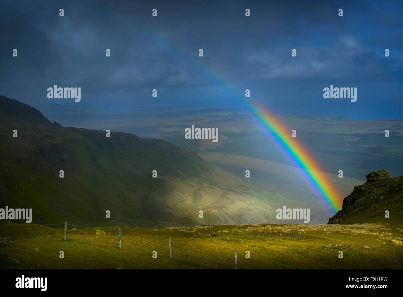 Rainbow over rural landscape Stock Photo