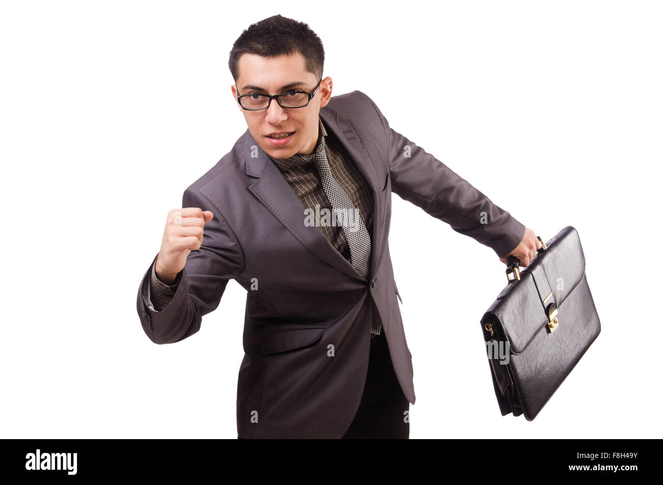 Young man holding briefcase isolated on white Stock Photo - Alamy