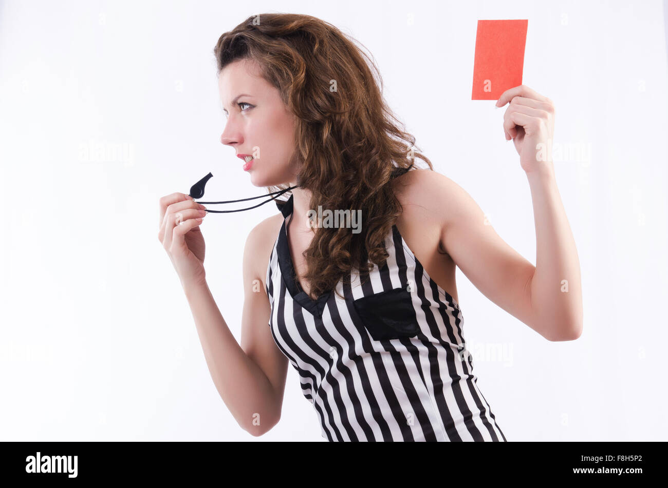 Woman referee with card on white Stock Photo - Alamy