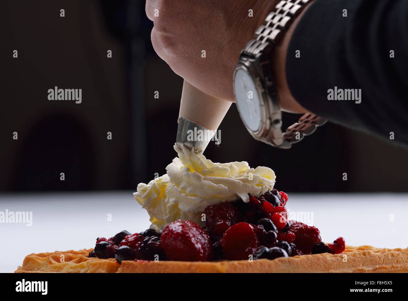 a selection of three italian gelato icecream scoops topped with nuts