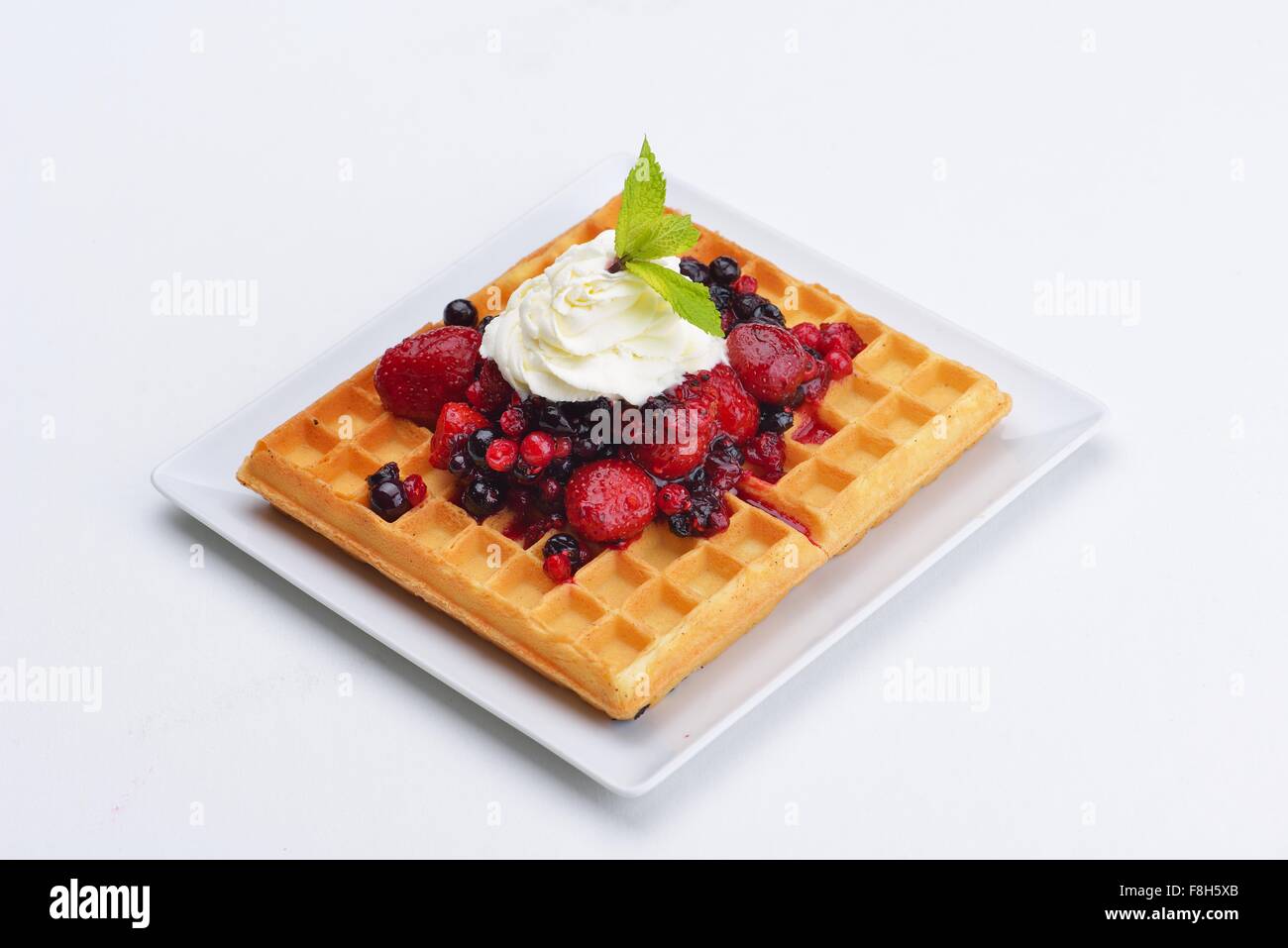 a selection of three italian gelato icecream scoops topped with nuts
