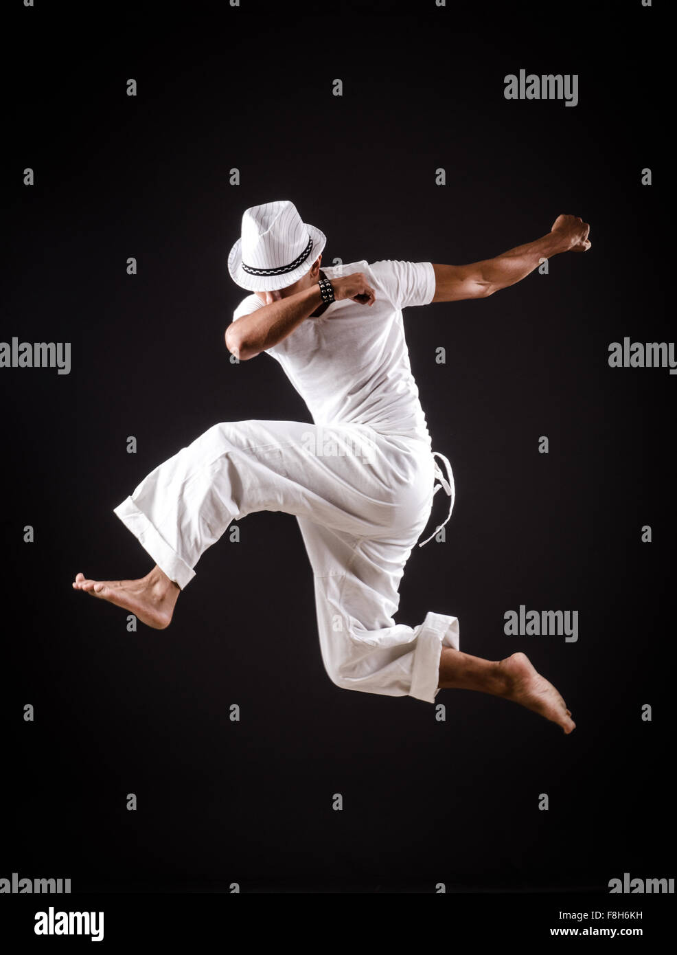 Dancer dancing dances in white clothing Stock Photo - Alamy