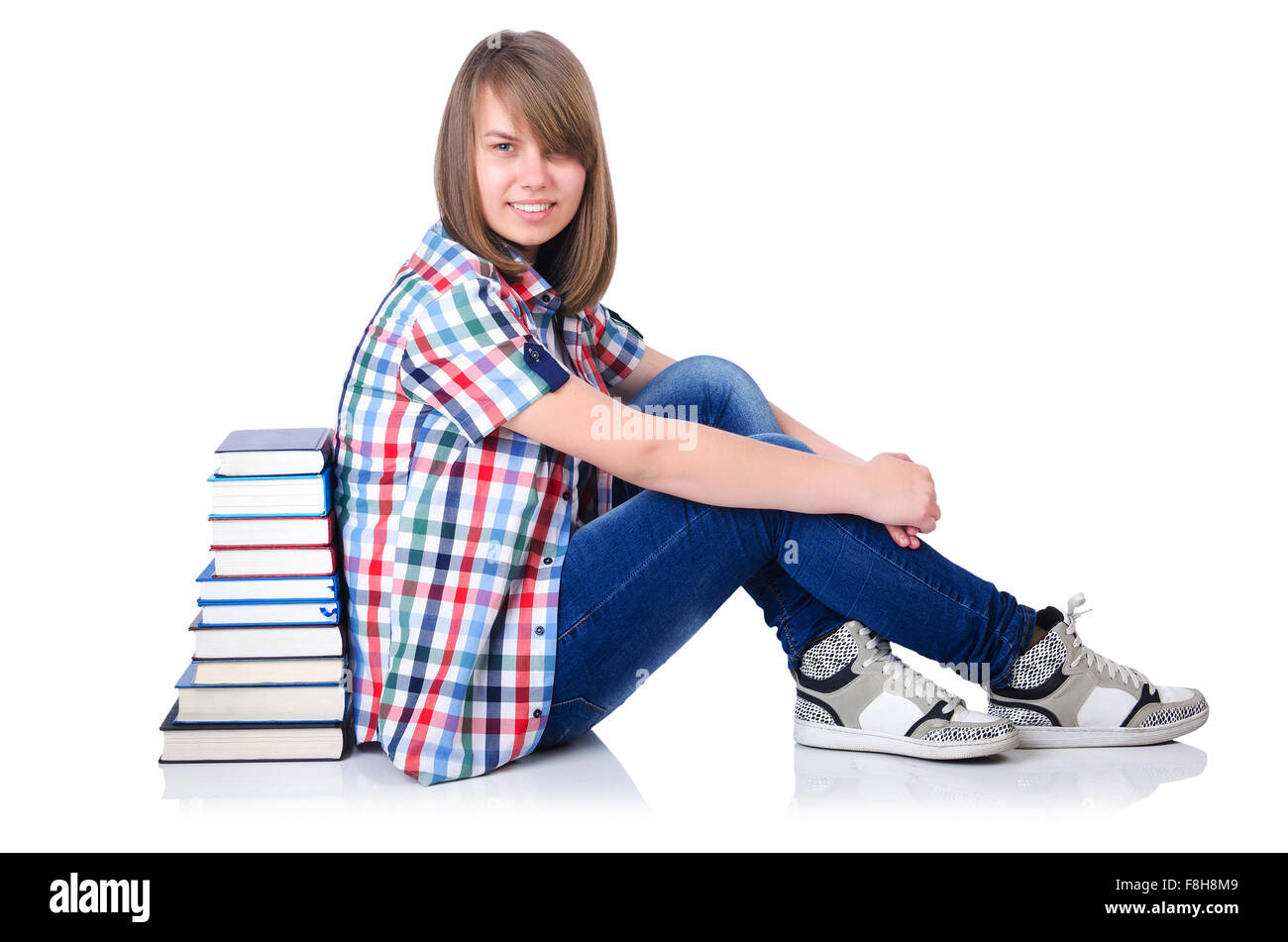 Girl student with books on white Stock Photo - Alamy