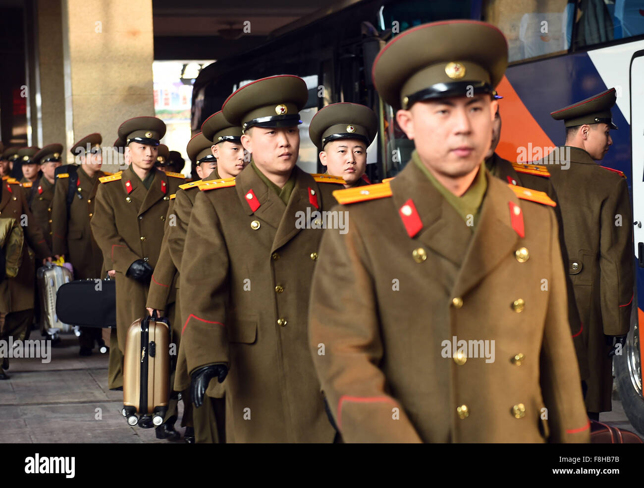 Beijing, China. 10th December, 2015. Members of the State Merited