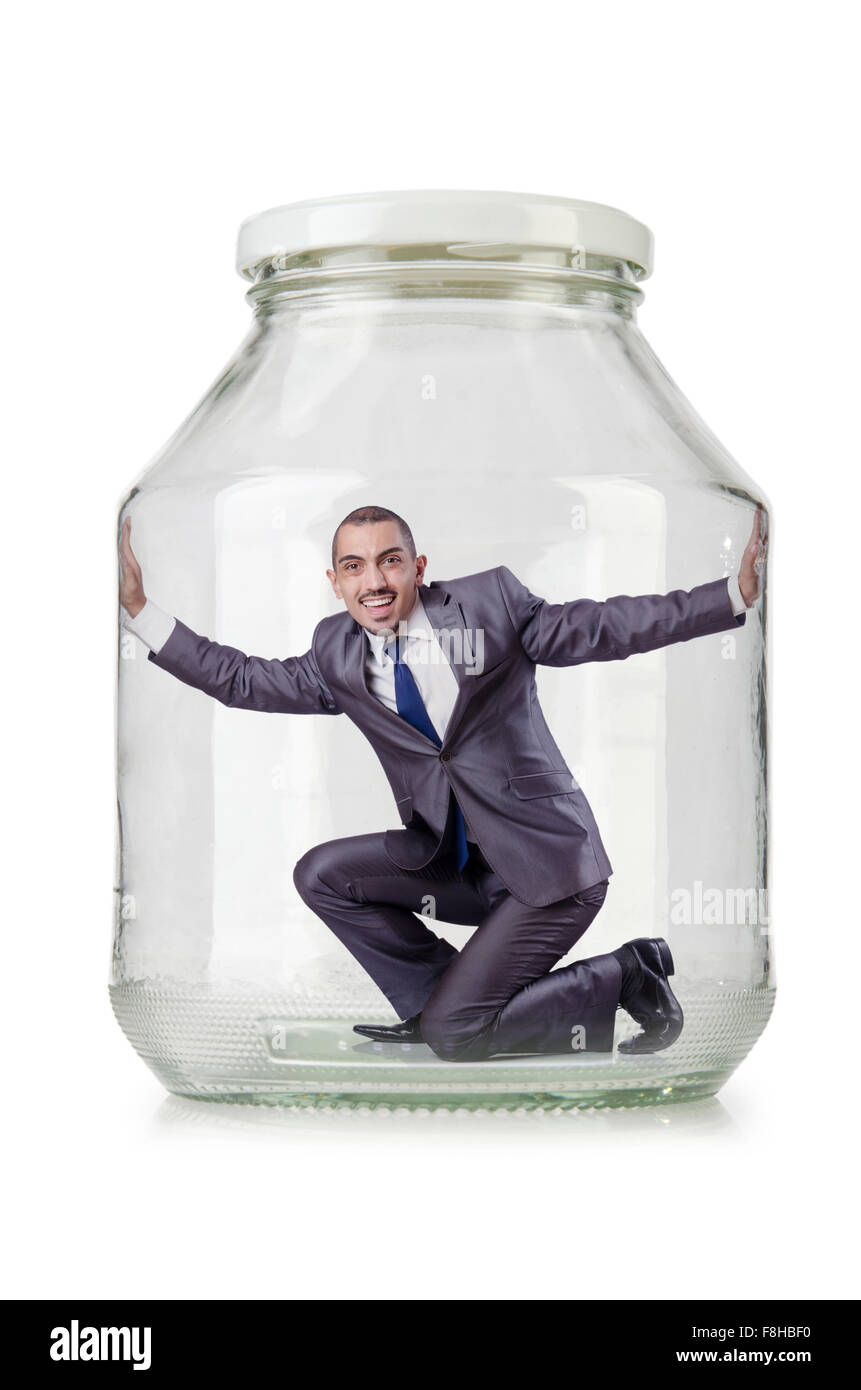 Young businessman in glass jar Stock Photo