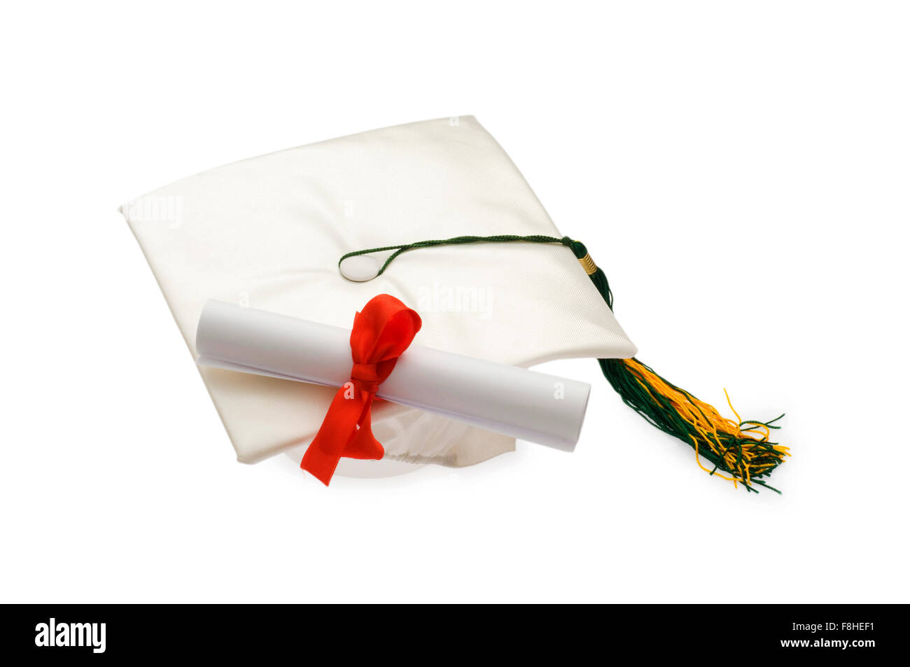 Graduation cap and diploma isolated on white Stock Photo - Alamy