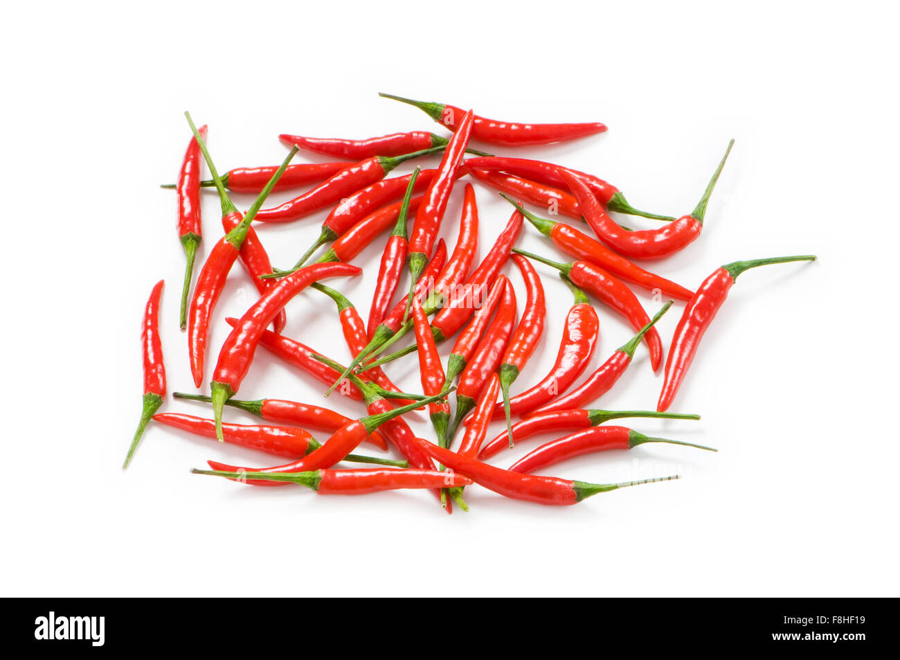 Red chili peppers isolated on the white Stock Photo - Alamy