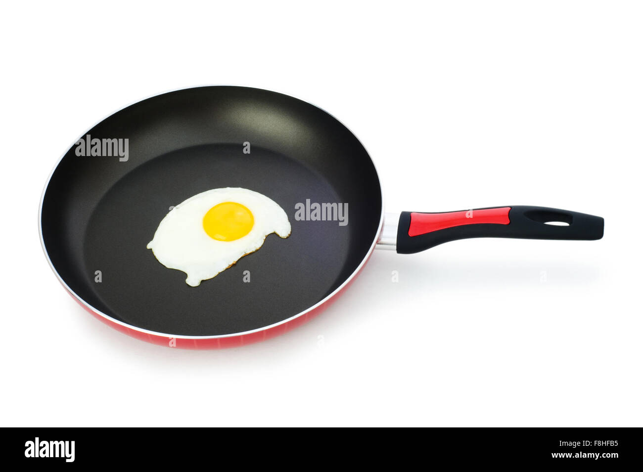 Frying pam with fried egg isolated on white Stock Photo