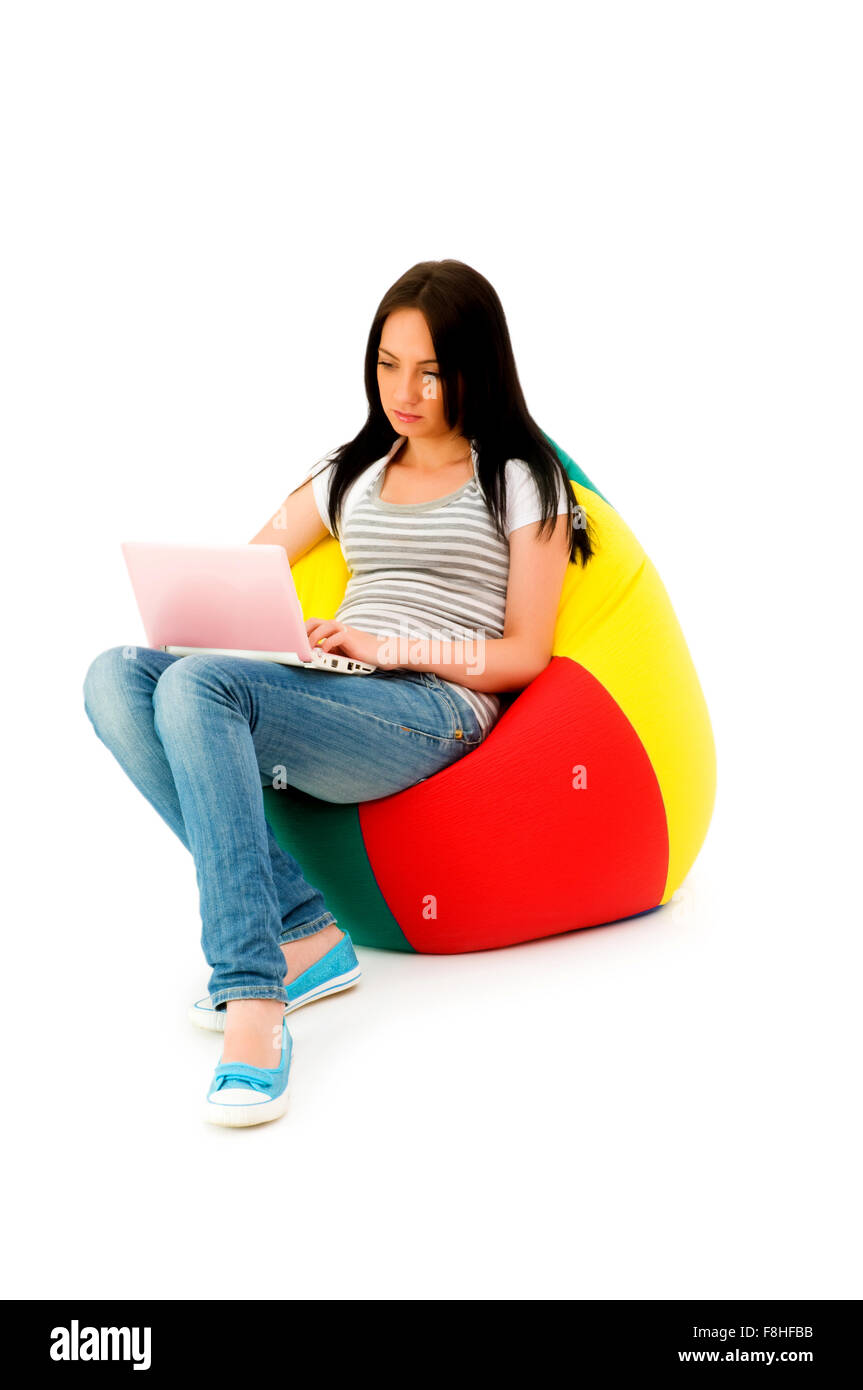 Girl working on laptop isolated on white Stock Photo - Alamy