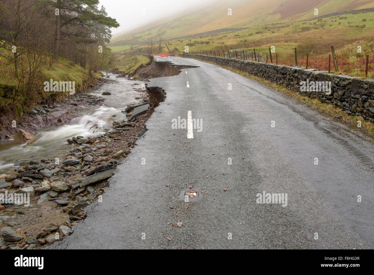 Lake District, Cumbria, UK. 09th Dec, 2015. The aftermath of storm Desmond, The A591 main road through the Lake district collapse and is washed away Credit:  Rafael Garea-Balado/Alamy Live News Stock Photo