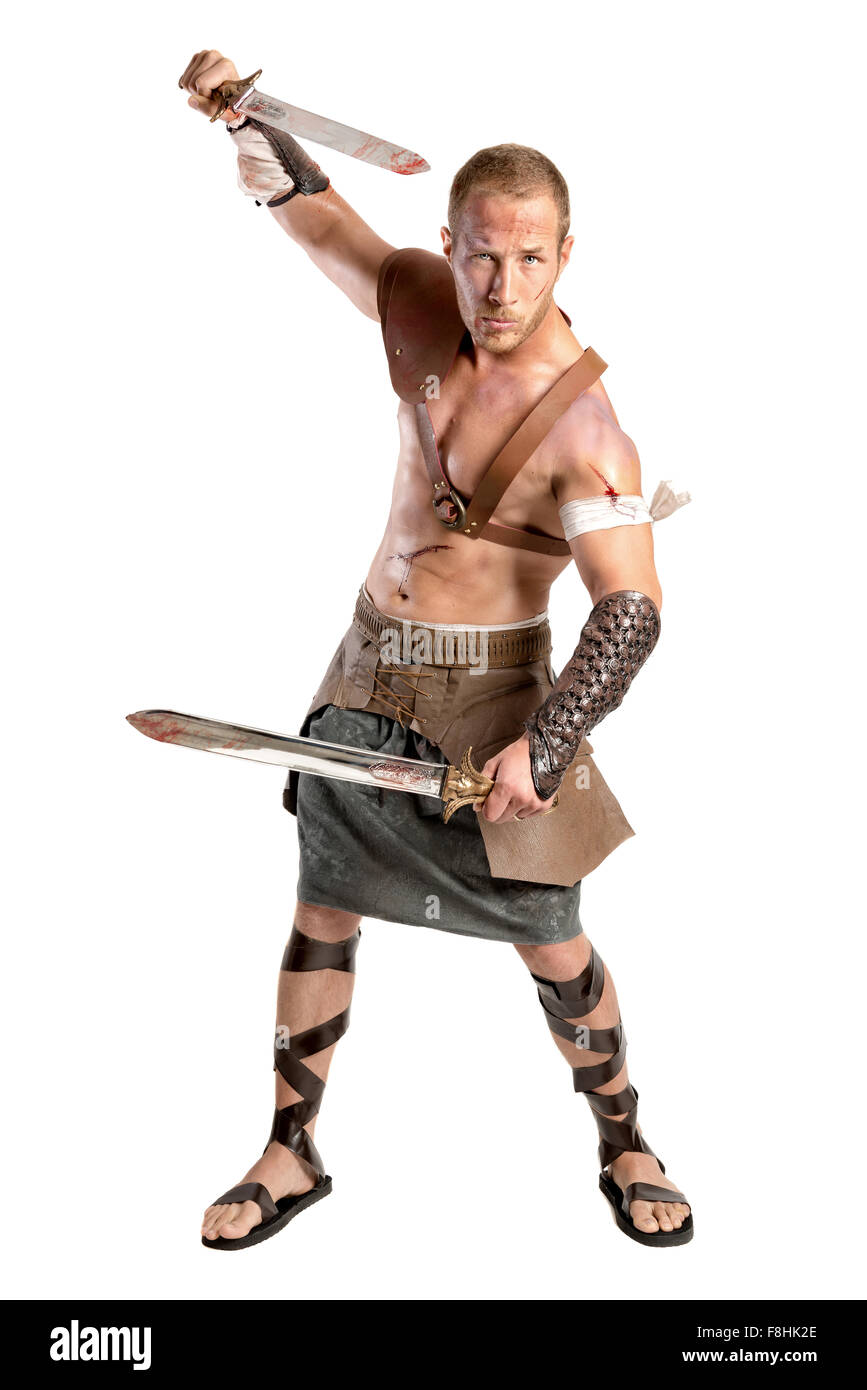 Gladiator posing isolated in a white background Stock Photo - Alamy