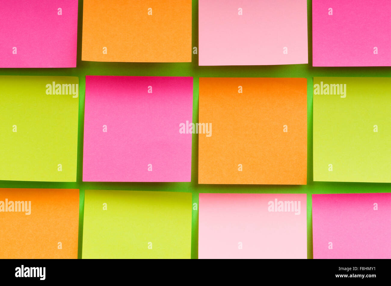 Reminder notes on the bright colorful paper Stock Photo - Alamy