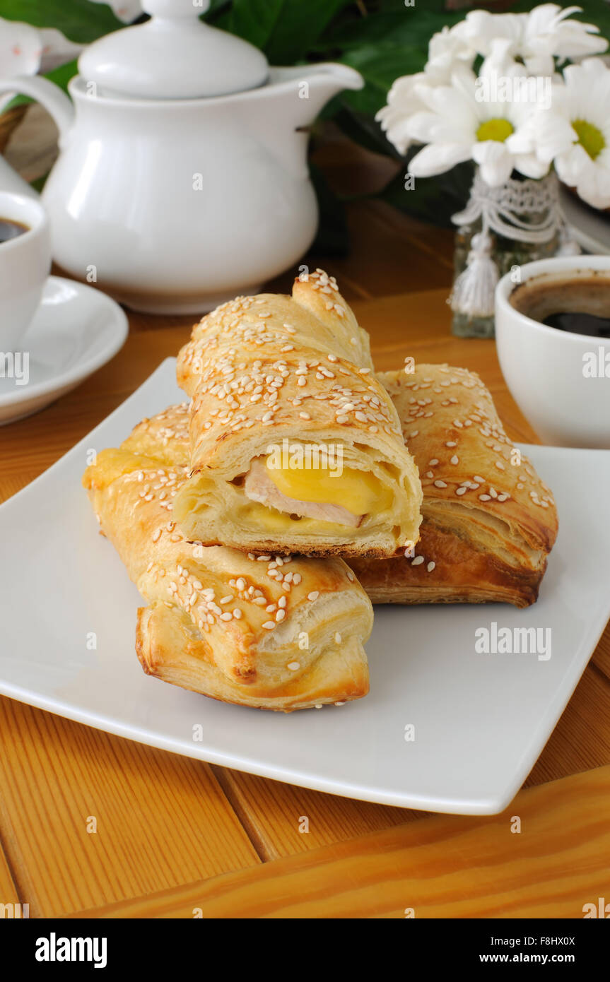 baked puff pastry with sesame, ham and cheese Stock Photo