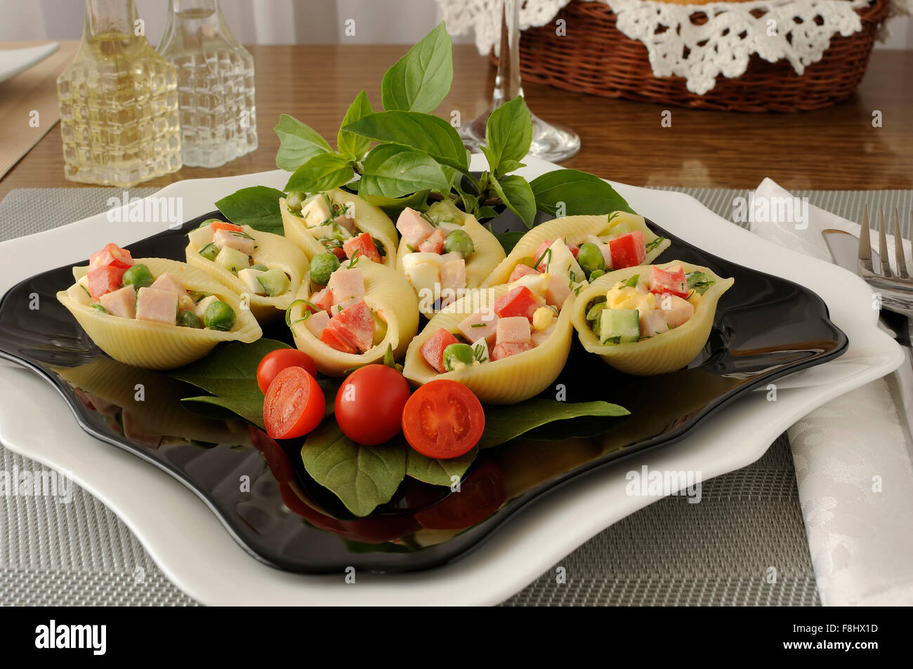 Large pasta shells stuffed with vegetables and ham Stock Photo Alamy