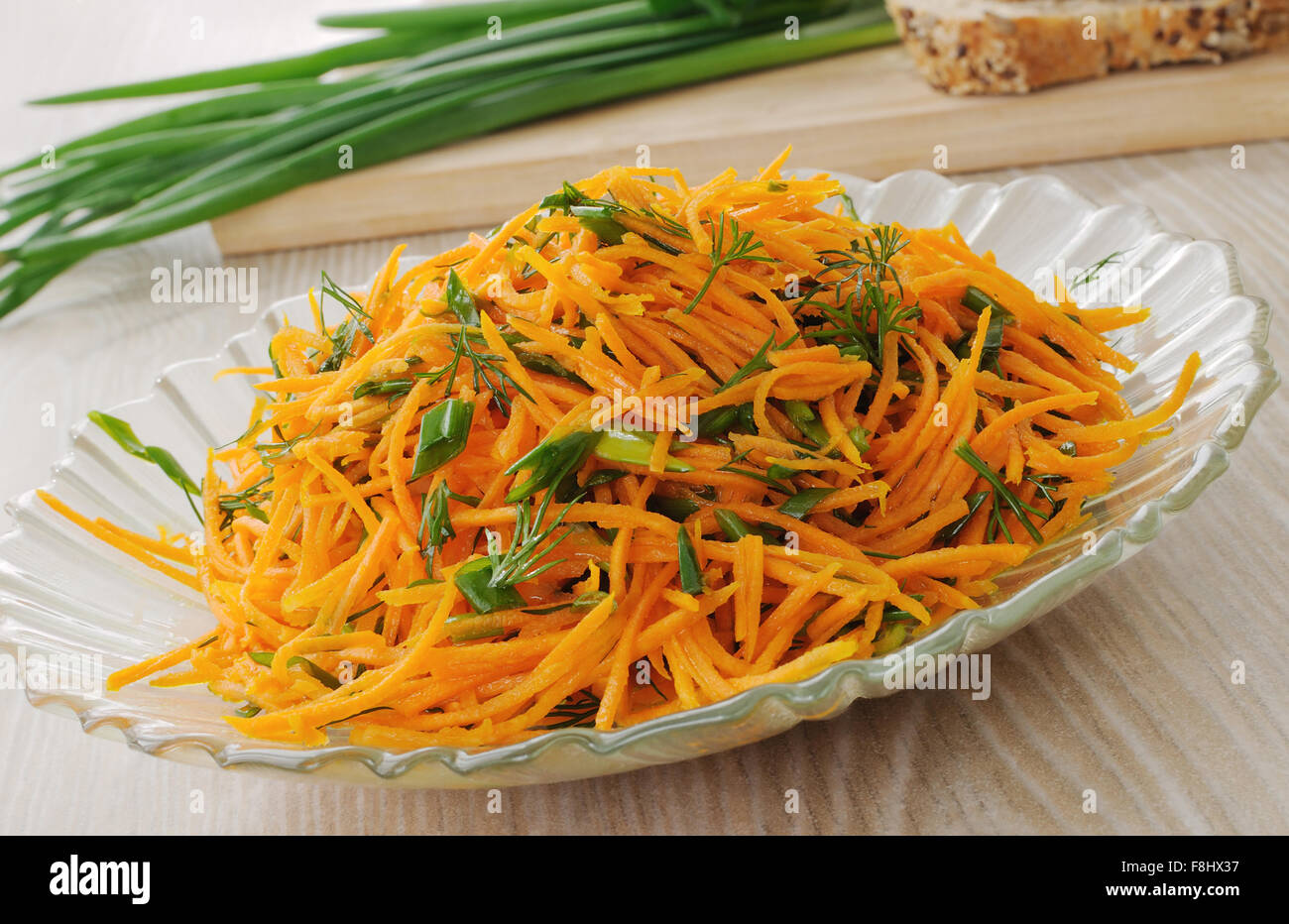 Carrot salad with green onion and dill Stock Photo