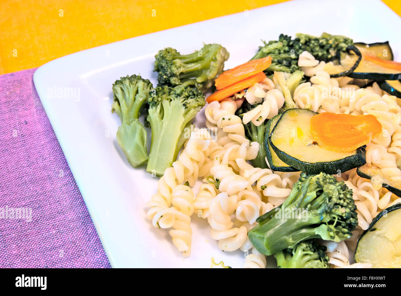 Italian pasta girandole with broccoli, zucchini and carrot Stock Photo