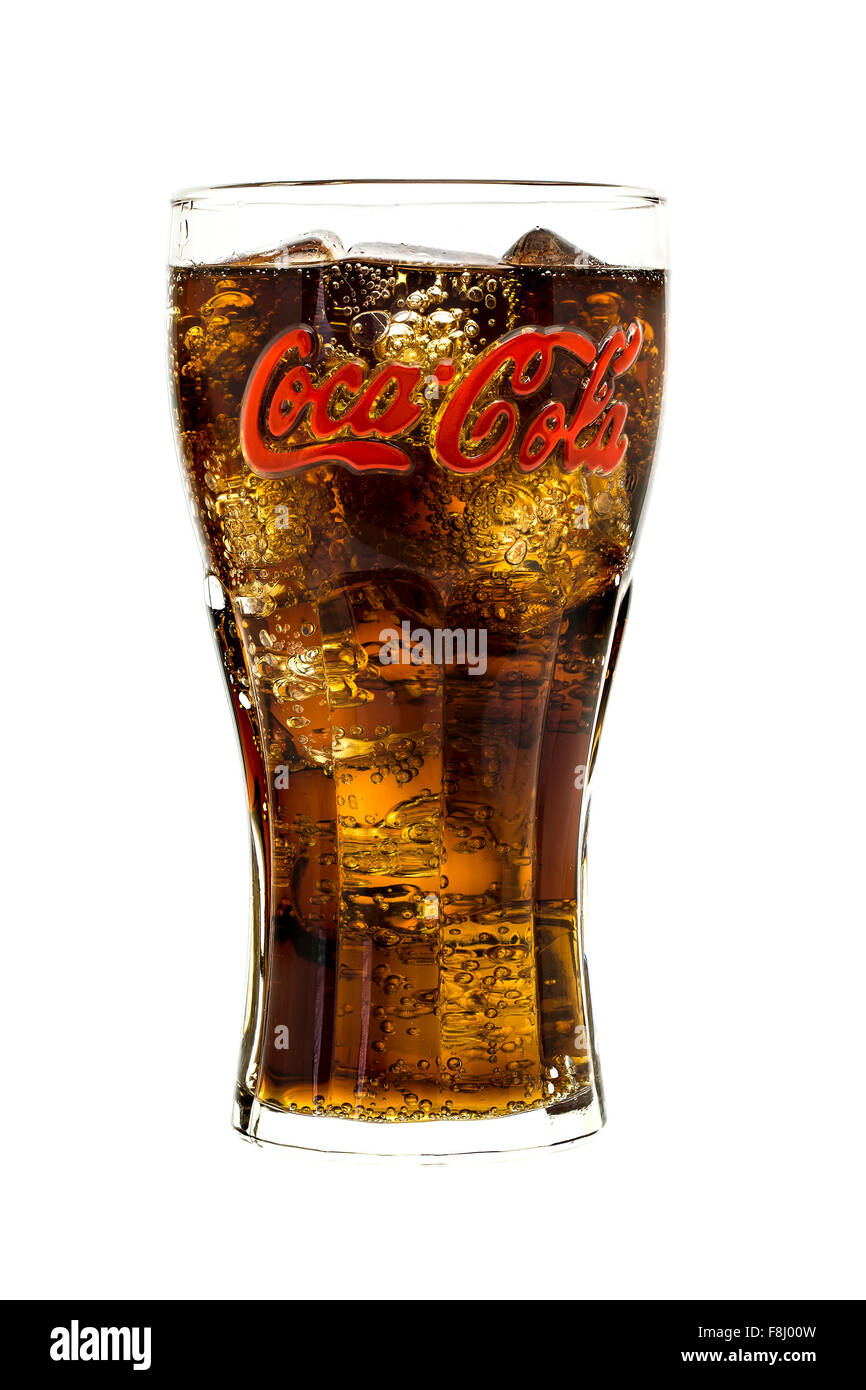 Coca-Cola in Classic Retro  Branded Glass with Ice on a white background Stock Photo