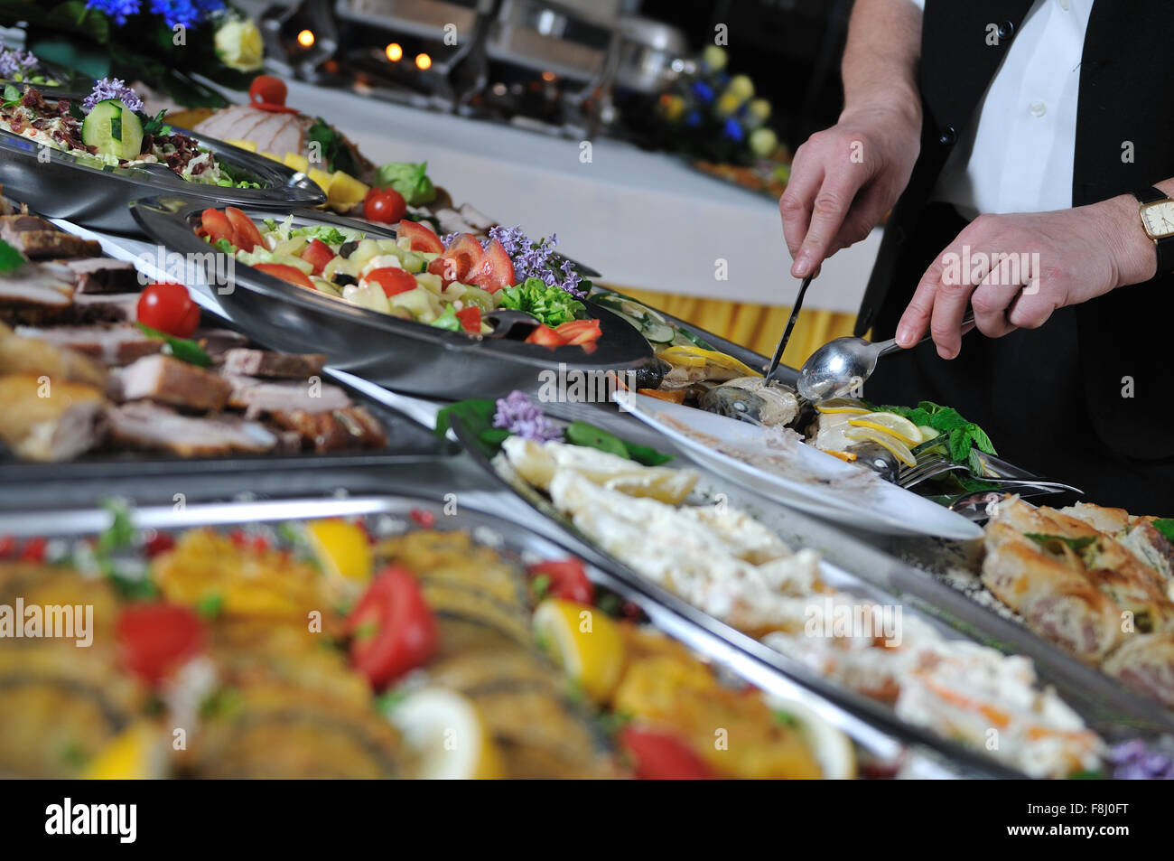 buffet catering food arangement on table Stock Photo - Alamy