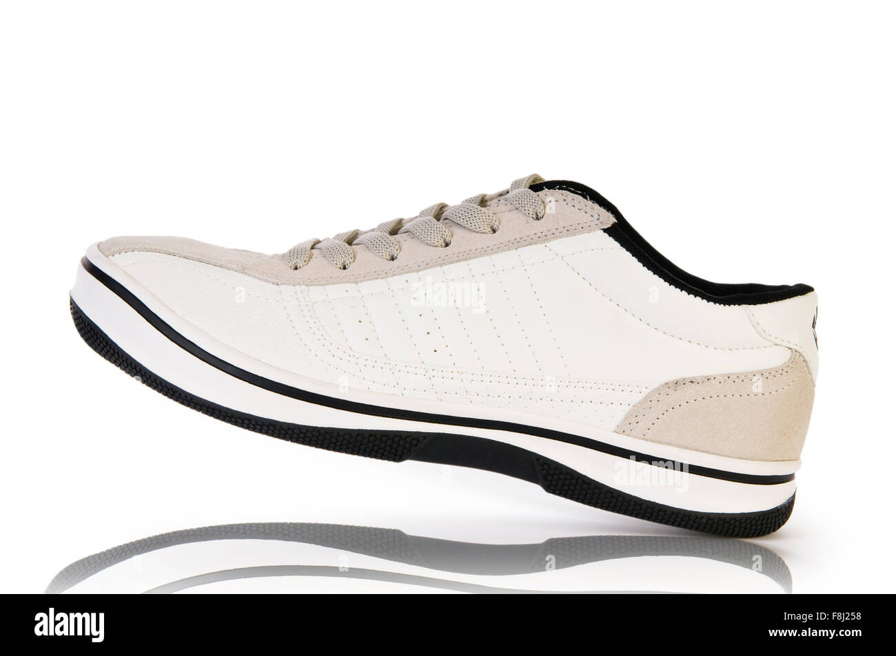Sport shoes on white background Stock Photo - Alamy